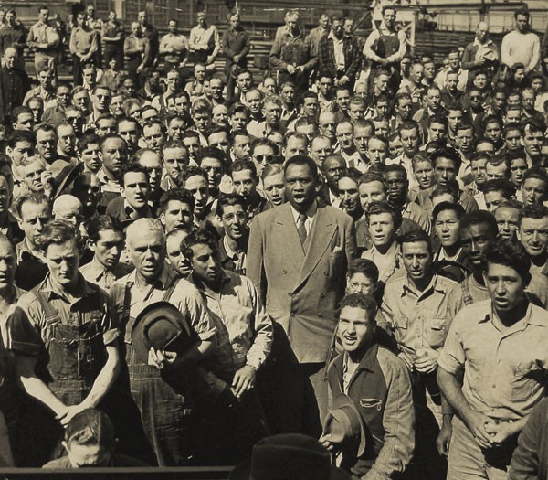 Entertainer Paul Robeson sings to laborers working at the Moore shipyards in Oakland, California. September 21, 1942 (Oakland Tribune)